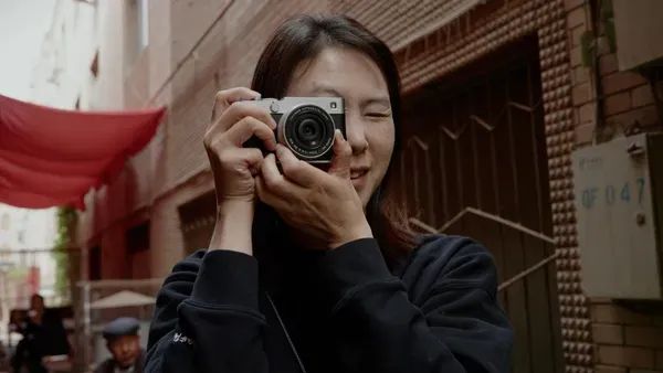 Photographer with Fuji camera